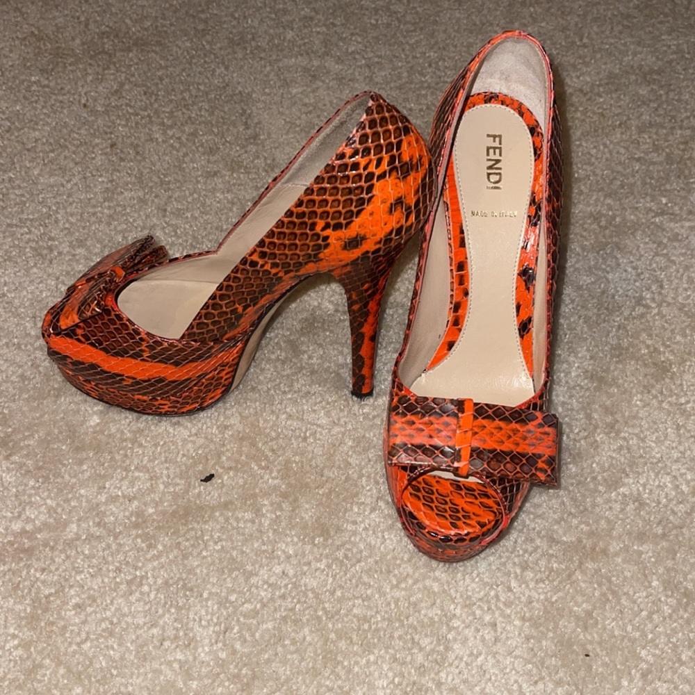 Snakeskin peep toe pumps